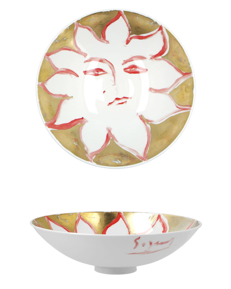 Dekorative KPM Schale mit einem Sonnenmotiv mit Gesichtszügen.